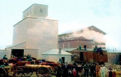 [ Flour mill with workers, Verigin Saskatchewan 1911, Alexandra Korcini, Doukhobor Discovery Centre, Castlegar, BC B-185 ]