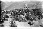 Piles of freight on the summit of Chilkoot Pass