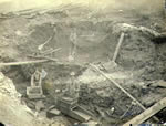 Gold miners with a rocker at work on Skookum Hill, Bonanza Creek