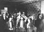 Men and women at the bar of the Monte Carlo, Dawson
