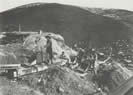 Miners Using Sluice and Rocker Boxes on a Hilltop Claim