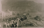 People line the road from Verigin's home at Brilliant awaiting the bier