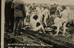Naked Doukhobors on pilgrimage are forced to dress outside Yorkton, Saskatchewan